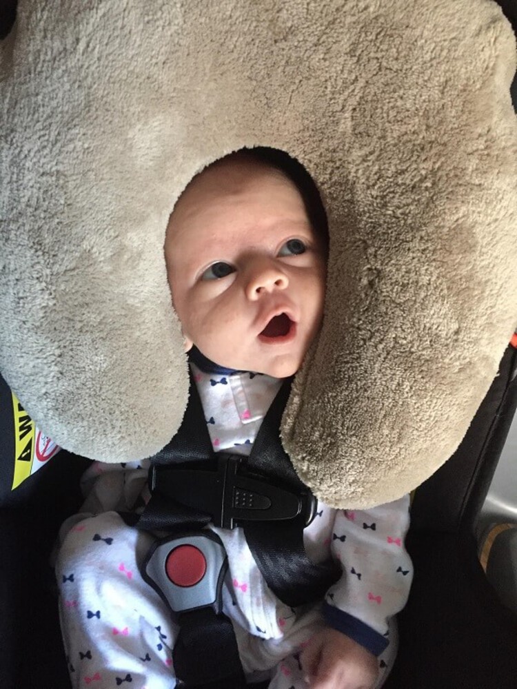 ConceiveAbilities - Traveling with a baby using a neck pillow