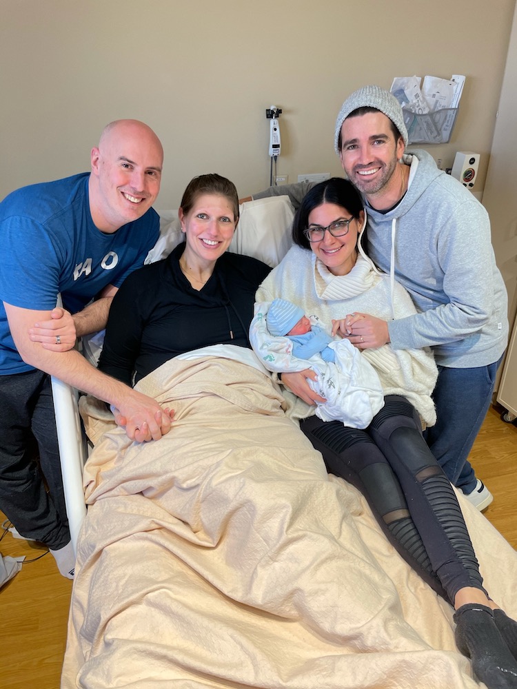 Ashley Katzen with her newborn baby, husband, surrogate mother and surrogate husband